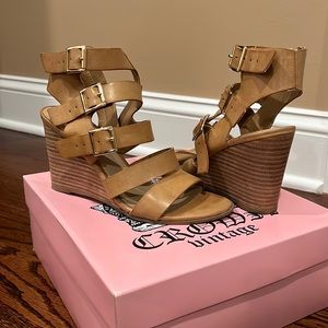 In box worn once. Stack 3 inch heel. Tan gold hardware size 6